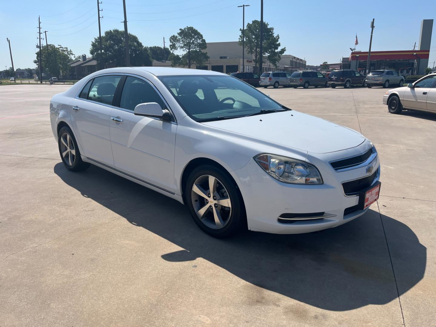 2012 white /black Chevrolet Malibu 1LT (1G1ZC5EU4CF) with an 2.4L L4 DOHC 16V FFV engine, 6-Speed Automatic transmission, located at 14700 Tomball Parkway 249, Houston, TX, 77086, (281) 444-2200, 29.928619, -95.504074 - Photo#0